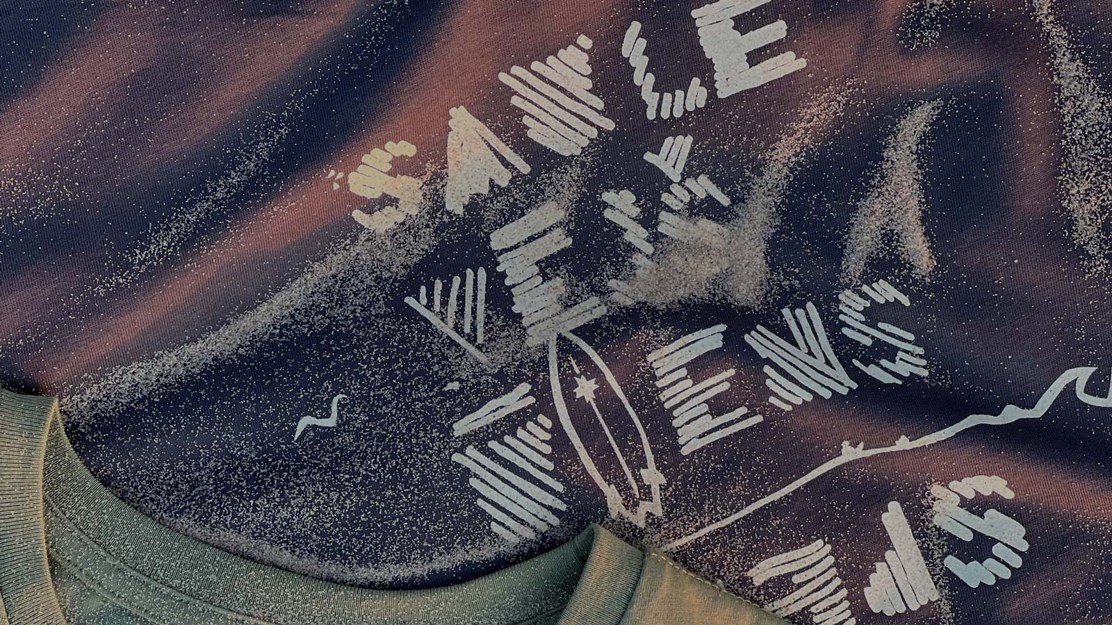 Watersport Lifestyle apparel closup. In waves and power of water we trust. Wind in our hair. Sun in our heart. Joy of living and loving full life.