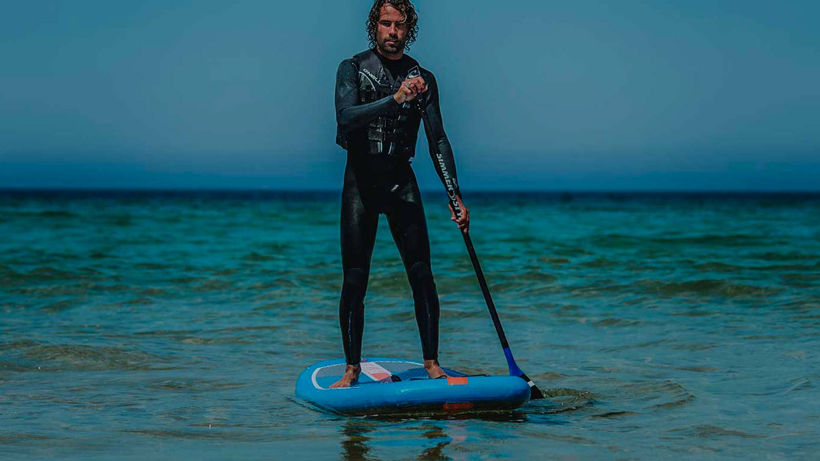 Stand Up paddle Boarding in open waters. Life Jackets are essentilal safety.