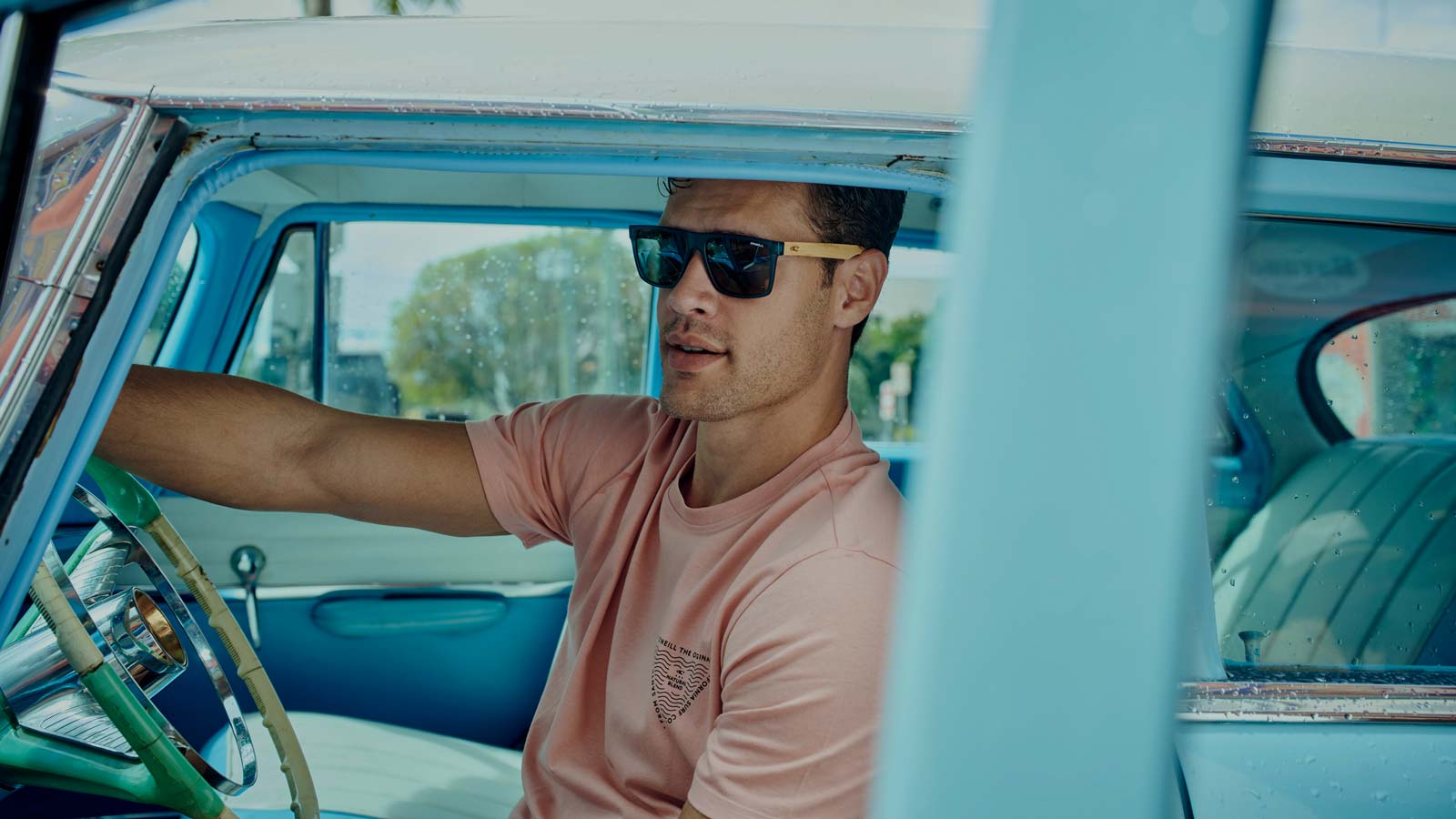 Watersport and Casual Sunglasses. Retro Classic American Car. Turqoise saloon. Vintage style sunglases.
