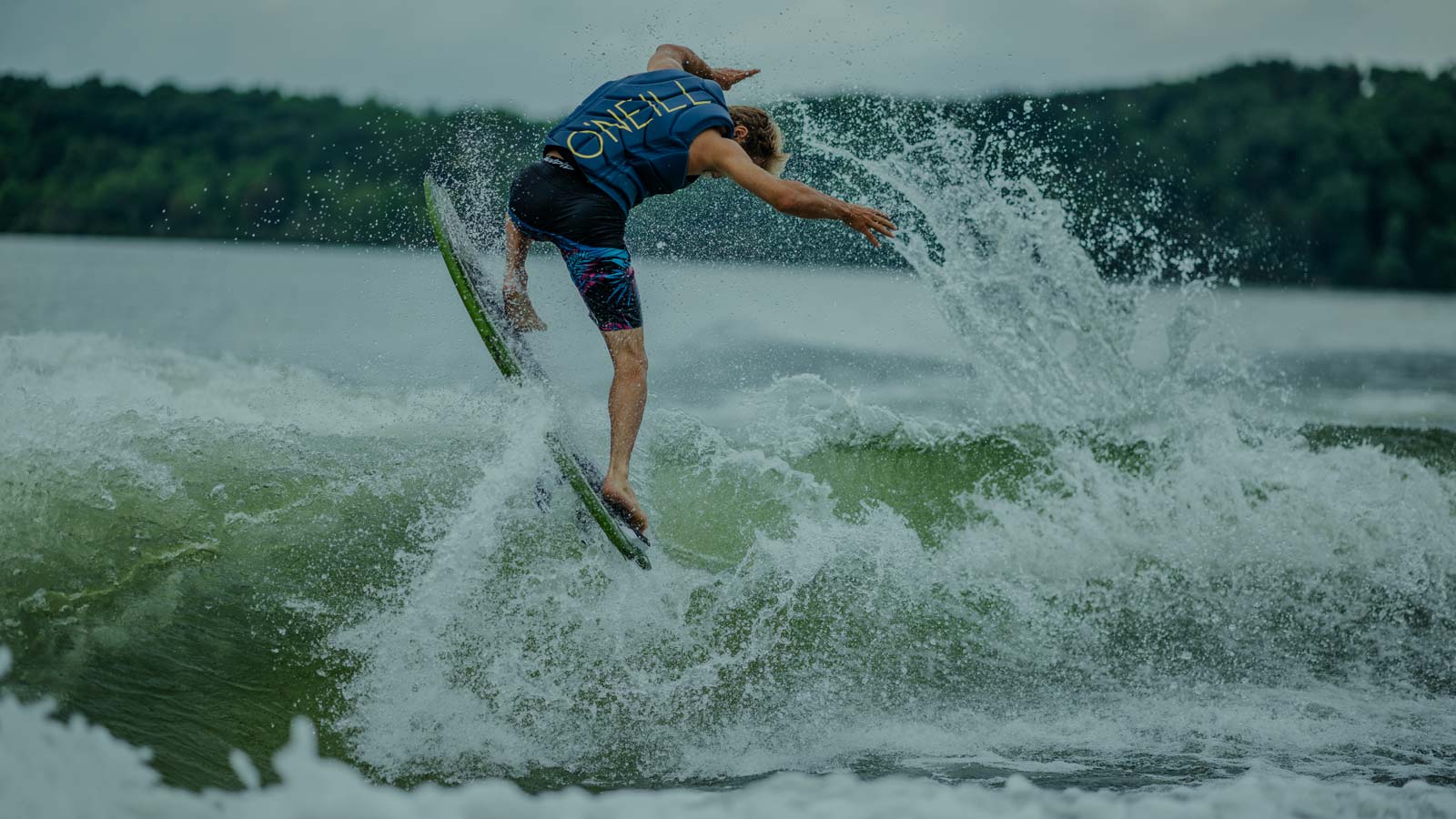 Areal trick on a wakesurf board. Nice wave. Gig slpash. Great steeze.