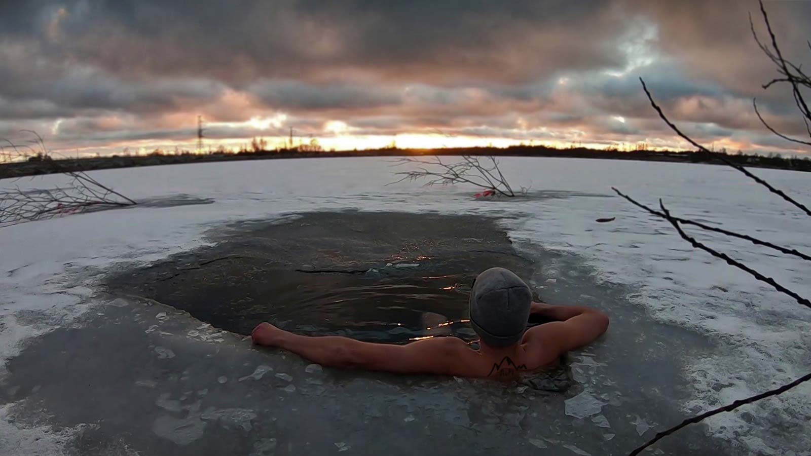 Winter Evening. Cold Water Plunge. Rest in the icy water.