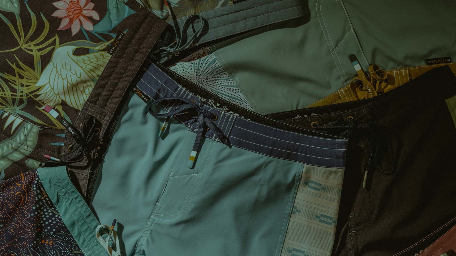 Colorful boardshorts and casual shorts featuring beach and nature patterns. Surf and Street Apparel.