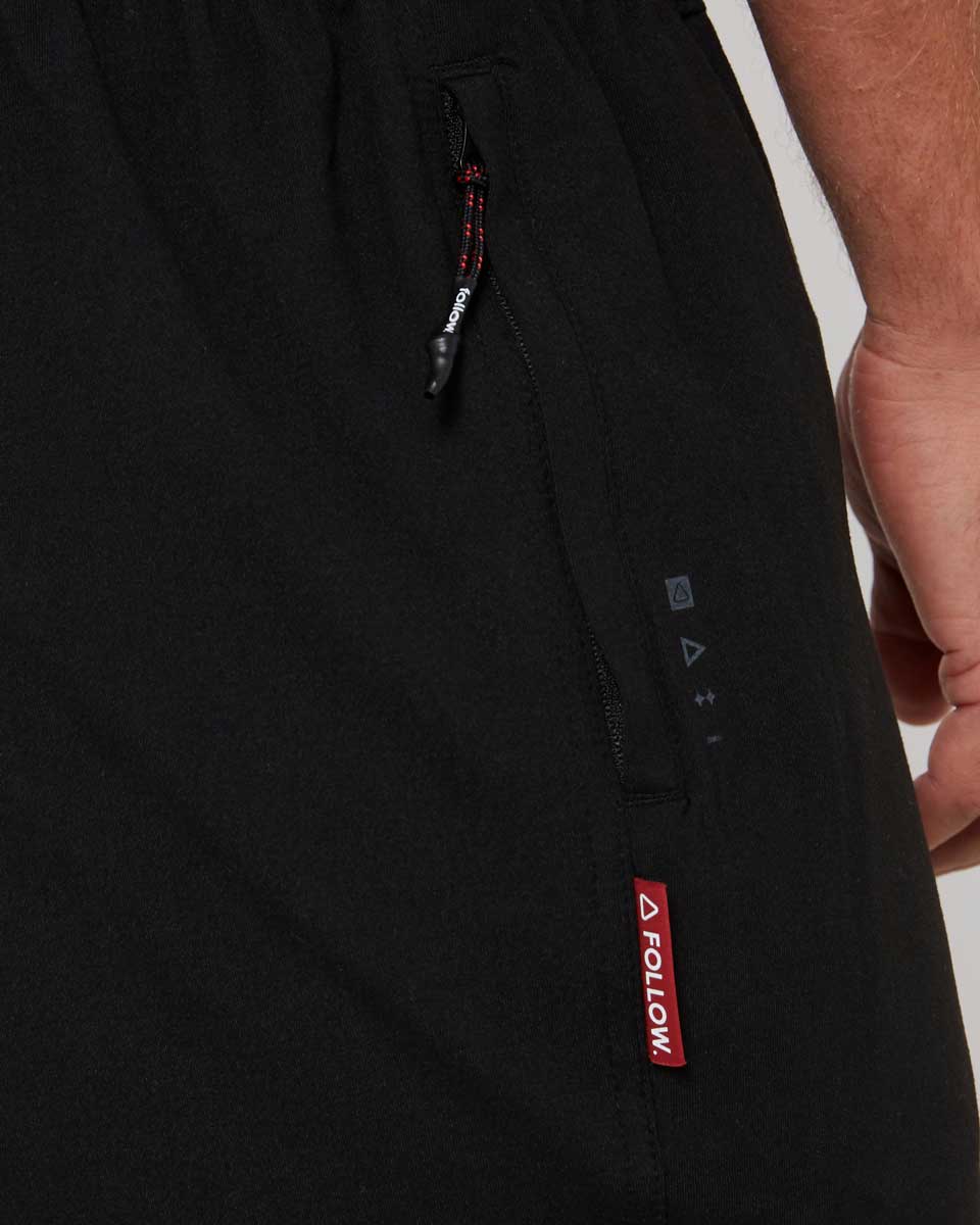 Follow Couch Trackies – Black