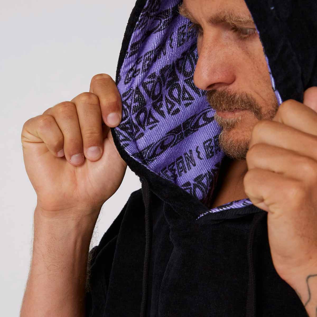 Ocean & Earth Strike Hooded Poncho – Black